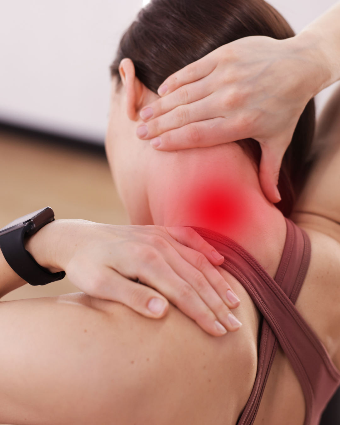 Athlete receiving hands-on care for neck and shoulder pain in the office
